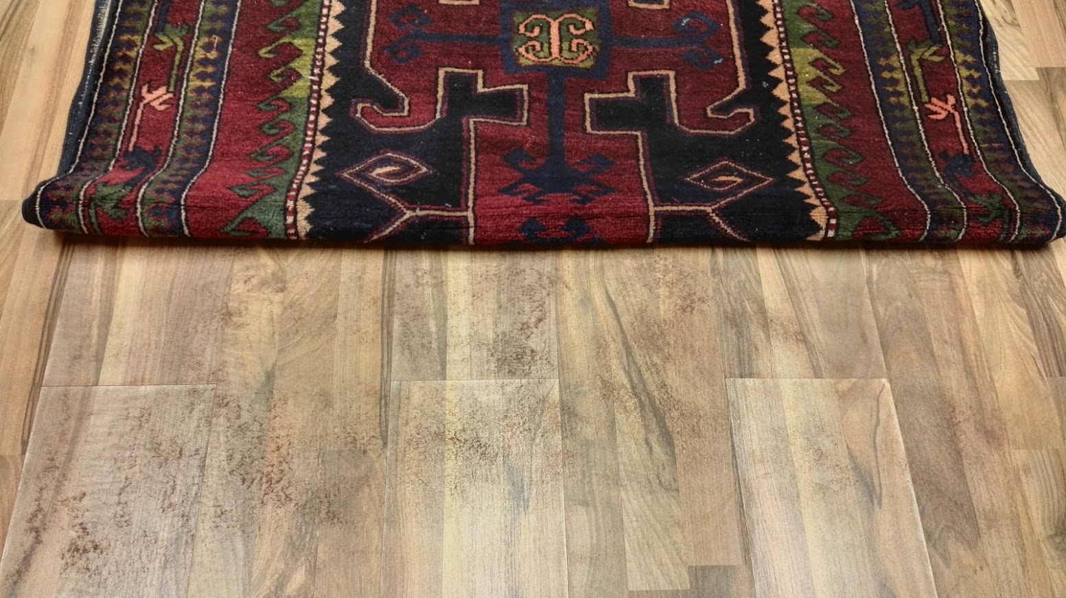 Perský vlněný koberec po klepání Kirby